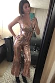 Overall I am satisfied and will wear it for New Years. The outfit runs slightly large width wise. It also isn't very forgiving length wise, I'm not quite sure how their 5'11 model fit into an XS, the mediums torso length was almost to short on me and I am 5'10. The sequins aren't itchy from what I could tell, the interior is lined. - Anna A.