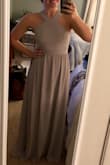 The dress runs long but I assume that's because it's easier to get it shortened than to add fabric. I'm wearing this in a wedding as a bridesmaid. I love the fit and the color! I usually take a size small in tops. Sometimes medium. And in bottoms I'm always a 27. - Shannon A.
