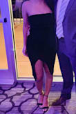 I am usually a size small but I choose an extra-small due to previous reviews. That being said, it was a bit of a struggle to zip but the fit was perfect. I usually have difficulty with dresses staying up due to being bustier, so I loved the fact that it had a rubber strip at the top to hold it up. I didn't need a bra and it did not move at all through a whole night of dancing! Very form fitting and perfect cloth and color for the holiday time. - Sahana M.