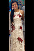 I very much loved the dress. Only problem I had was I had to get it altered since it was too long. But it was an easy fix. Very worth getting. - Kimberly L.
