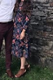 This dress is literally perfect. It looks so classy and is so comfortable. I am typically between a small and medium and ordered this dress in a small and it is perfect. SO many compliments! Highly recommend!! - Kasey K.