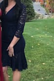 I loved this navy blue dress I recently wore to a wedding. It is the perfect length - it's not too short, but has a lower cut in the front if you want to show some cleavage. I received many compliments. Thanks Lulus! - Ashley C.