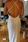 I am planning on wearing this to the rehearsal dinner for my wedding. Really cute but the breast area is too large and gets a bit loose in the back because I am smaller chested. Still a gorgeous dress so I am going to get it altered! - Ssaholy M.