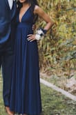 It fits well in all the right places! I had to alter the length of it, but you'll only have to if you'll be switching from heels to flats. I love everything about it! - Jade