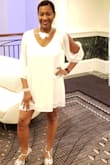 I absolutely love this dress! I brought 3 of them! I can't wait to wear the green one on Christmas. The fit is true to size. (I'm wearing a medium). It's roomy, comfortable, and the length is perfect. I wore my dresses to a wedding and holiday party and I'm still receiving compliments! You'll feel sexy and glamorous as soon as you put it on. You'll definitely turn heads and all eyes will be on you when you wear this dress. - Tesha P.