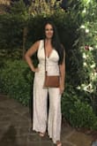 This pantsuit is so comfortable and I received many compliments. My favorite piece I own! Fit my measurements as size states perfectly. Wish I could order another one because my bamboo purse I used that night ruined the lace near the legs. I loved this outfit! - Debra G.