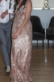 I wore this for a wedding and LOVED it! The material was stretchy so it was comfortable. I normally wear a size small for dresses and this did not disappoint. I had a 2 inch heel and am 5'3" so the length was perfect! - Ellen M.