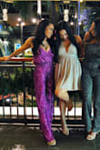 I wore this jumpsuit to my company holiday party and received compliments all night long! The fabric is so much more gorgeous in person. It is literally my most favorite piece of clothing I've ever owned. SO BEAUTIFUL! If you love to stand out and sparkle, you will LOVE this too!

Side note: It is quite long, but I'm 5'2", so I wore 6 inch wedges and I was fine! - Marysa C.