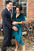 I wore this dress to a London wedding in October and it was PERFECT! Such a gorgeous and lush colored fabric, and I received compliments ALL NIGHT!  It's so beautiful that I bought one for my sister too! Get this dress! YOU WILL LOVE IT!!! 
Side note: You MUST STEAM this dress before you wear it, but once it's done you will really see how gorgeous this dress truly is. Also, I tried on the small as well, but it was a bit baggy for my frame and looked more like a robe than a dress. If you're around my size go for the X-Small. - Marysa C.