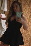 I have this dress in black and red, and it is my favorite!! It's sexy, flirty, and fun! I have a 32 DDD bra size and my chest stays put without a bra. It's nice that it has shorts under it too, so if you are taller you don't have to worry about the length. - Kelly M.