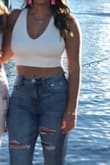 I am completely obsessed with this top! It is definitely a staple top in my closet now. It's perfect for the beach, a country concert, or a night out dancing with your girls. I wore flower pedals with it, and it was perfect. The back is super sexy! I've worn it 3 times since my purchase and have been stopped every time asking where I bought it! - Casey C.