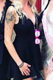 I instantly felt flirty and fun once I put this dress on. I love the movement of the dress and the fact that it has built in shorts. There is also underwire built into the V cut out which helps keep its shape and fit my torso so well. Wore for a bachelorette party and I received so many compliments on it. BE VERY CAREFUL when washing this dress. I washed in cold water and very low heat and it shrunk small enough to fit a toddler. I ended up buying another one because I loved this dress so much. I had to have it! I will be much more careful next time when washing. - Mandi Y.