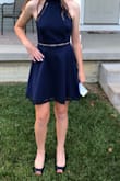 This dress was my homecoming dress. I loved it. The material felt great and it fits true to size. It is a perfect length and is fine to wear without a bra if that's what you are comfortable with!!! I highly recommend this dress for a wedding, homecoming, or any occasion. It is a great dress, Lulus did amazing!!!!!! - Melanie H.