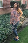 The material is very lightweight and flowy. The fit is loose so there's lots of room if you have hips or a big chest. I have worn it with a bralette and no bra (bras can show because it is low cut in the armpit) but very cute! Shoes are Lulus as well. - Kami C.