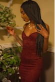 This dress is sexy and feminine, it fits true to size. I have a small frame but the dress accentuates my little curves and has a nice comfortable stretch to the fabric. Absolutely love it & recommend. - Tyema W.