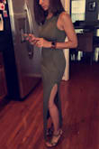 Perfect dress! Fit like a glove. Didn't stretch out. I have so many black dresses I went with the olive. Looks great on tanned skin and brought out my green eyes. It can be dressed up or down so I plan to get a lot of use out of it this summer. I wore it for my anniversary and my husband loved it. Got compliments all night from others as well. The slit is a tad high when sitting down, but nothing a napkin didn't take care of. - Sara
