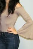 I was obsessed with the beige color and the off-the-shoulder design of this top. It fits perfectly, and the flared sleeves are a super cute touch! Unlike most off-the-shoulder tops, the elastic band around the upper end helped secure the top and I didn't have to worry about constantly pulling it up or adjusting it throughout the night. Cute and casual! - Neda N.