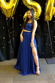 I have worn this dress twice now and each time it still receives so many compliments. The bright blue definitely stood out and made a statement. Since I'm short, I would need to hem the bottom because even with 3 inch heels the dress still touched the ground. - Ashley P.