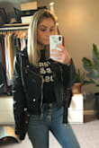 I searched long and hard for a vegan leather moto jacket and so glad this came back in stock so I could snag it! This jacket is the perfect fit, doesn't make you look bulky but it isn't too tight. There was a smell to the jacket when it first arrived, but I aired the jacket out and the smell went right away. - Amanda B.