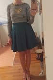 This dress is super cute. I was looking for a full skirt for Christmas dinner. Paired this little dress with a black and white crop top I found on Lulus to keep me warm :) the dress is good quality and sits just above the knee. The skirt had just the right amount of 'poof'. - Nicole H.