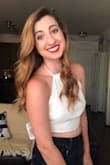 I adore this top. It's a bright white, and thick enough that you can go braless without worrying about a wardrobe malfunction. It's easy to put on and take off, which is a nice surprise! - Kayli