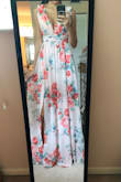 Such a gorgeous dress!! I got so many compliments when I wore it to a wedding. I'm normally an XS, but I bought a Small because of the reviews and it fit perfectly. I wasn't a fan of how low cut it is, but that was easily fixed with a few stitches! Loved it so much! - NP