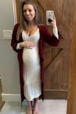 I washed and dried it once and it fit just fine. I loved it for my work Christmas party. I got a lot of compliments on it. I'm pregnant so it was also very comfortable. I love how I will be able to wear it even after my pregnancy. - Samantha Z.