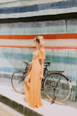 I love throwing this over my bathing suit for an easy yet chic look for town before heading to the beach! Plus, it's flowy and the color really pops. - Kelli K.