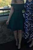 This dress is made of very nice fabric and fit like a glove. I was worried about it being an off-the-shoulder piece because I have a large bust (32G) and a small waist, but it stayed up just fine all night. I definitely recommend this dress for any special event. It is classy and timeless! - Sarah R.