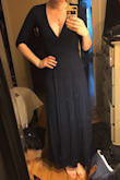 I couldn't get the slit to show the way it's pictured after wrapping it. It was a little short for my liking, I like my dresses to hit the ground. The material was also pretty thin and I ended up returning this one. - Melanie B.
