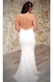 I used it as my wedding dress! Loved it. The dress is comfortable. I ordered a medium because I did not want it to be too tight. I used a no-show underwear and a silicone gel petals and it was perfect, nothing showed. The dress is lined, this avoids a see through look. Overall, it's an simple but elegant and sophisticated dress. - Carolina R.