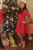 The material is stretchy thick. Very comfortable. It hides my unwanted imperfection. The color is perfect red. I had a blast at a Christmas party wearing it. I received many compliments! My husband also loved it on me. You can't beat this deal. Thank you Lulus! - CELESTINA S.