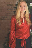 I love this shirt- it's so cute and I love the material. The red is so pretty and perfect for any holiday event - Taylor H.