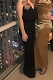 I wore this jumpsuit to a Christmas party and it was perfect for the occasion! The material is very comfortable but still looks high-end. The pant length was too long for me even with 4-inch heels, so shorter girls will definitely need a hem. The fit is very flattering and I received many compliments - only downfall is that it doesn't have a clasp at the top of the zipper, which made it hard getting in and out of without help....but overall, great value for the price and will definitely be wearing again! - Alyssa M.