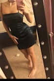 Sexy slimming! Tight on my chest and the bottom lose where my belly is. It's short but classy. It's not super low cut. I got it for New Years with the lulus fluffy black heels! I love it! - Ambrianna L.
