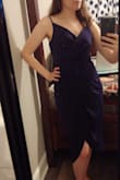 This dress is the perfect mix of sophisticated, flirty, modern, and classy. Adjustable straps help with the amount of cleavage and make it possible to wear with a strapless bra! Smaller chested ladies might want some tape or a padded bra for extra support of the front wrap. You do need to watch the front slit when you sit, but it's not revealing and I wasn't worried about flashing anyone. Nice thick material, beautiful sapphire blue color, very comfortable and looks fabulous. Bought this for a wedding and will definitely use again! - Danielle D.