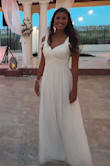 I bought this dress for my beach wedding and I loved it! Very flattering, and flowy. All my guests gave me many compliments. I just had it adjusted so the bust was smaller. - Mariana M.