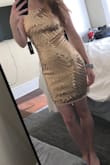 This dress fits true to size with a little extra room in the hips. It was longer on me than the model, but I'm 5'4" so that is to be expected. - Casey H.