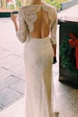 Loved this dress. It fit so well and my wedding guests couldn't stop telling me how beautiful it was. I got married in the backyard (which I highly recommend, it was perfect) so an inexpensive dress I could traipse around in the dirt in was awesome. Wish I had worn a stick-on bra and had had it hemmed an inch or two, but it worked even without doing those things. Neckline was so flattering. The lace sleeves stretched out a little over the course of the evening but that was okay with me. Still looked lovely. - Savannah S.