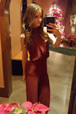 I love this jumpsuit! I got compliments on it all night and felt very comfortable in it. I did have to get it hemmed and taken in around my waist. It was worth it, though, it's a great jumpsuit that I plan to wear again! - Emily M.