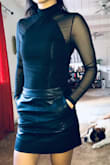 I had some trouble getting the neck over my head, it seemed very tight at first, I almost thought perhaps the XS was too small, but once I actually got the suit on it fit really nicely, better a slightly tight fit than a loose one with this kind of bodysuit. I also ordered an adhesive bra to go with this, very happy with this purchase. NOTE: I highly suggest putting the suit on BEFORE you apply make up and style your hair, it's quite tight getting it on and will definitely smudge your face. - Jasmine C.