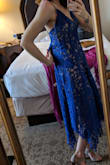 I wore this dress to a wedding and love the color and style! I ordered the XS and it ran pretty big. I was expecting the bodice piece to be form fitting, and it was very loose. Overall I love the dress. Getting it altered and will continue to wear. - Tori K.