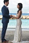 I wore this dress to my intimate beach wedding without shoes and it was absolutely perfect! It has a slim fit with a nice train. For me it was true to size. I usually am a XS/S and I got the dress in an XS with no issues. - Megan E.