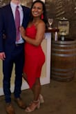 This dress fits like a glove. The material is thick, and the over flap covers any unwanted pooch in the tummy area ;) The color is vibrant, and I got so many compliments on the dress! Great price too. - RaeAna E.