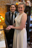 I bought this dress for my surprise wedding with my now husband. I don't think there are enough words to describe how much I loved this dress and how many compliments I received wearing it. We had our wedding in NOLA and EVERYONE was stopping to compliment the dress. I would recommend this dress for anyone who's on a budget and wants a beautiful dress without breaking the bank. - Christina J.