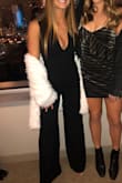 I loved the way this jumpsuit fit. I wore heels to make the length perfect but other than that it was just right. The front accented my chest really well and the open back was such a cute touch. Overall I would definitely order it again, in multiple colors lol. - Ashley J.