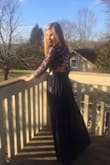 This dress is just as it is described. It is a little tight on the waist, but I knew it would be because my daughter fits in between the two sizes, so we with with the small so that it didn't gape on her in other areas. She's a 36B and it is a nice fit in the bust. It is long, and with her heels, it's a perfect length. We are happy with the purchase. - Toni H.