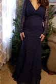 I loved this dress! I went with a medium size and it fit perfectly. It's true to size and it's very flattering. The dress ran a little long even with heels, but it had a small train in the back. - Angelina P.