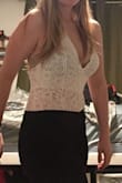 The lace is sheer but it's subtle, the real issue for me was the cleavage. I wore this with my bra and my bra poked out- I have no idea what bra I could wear this with, but you definitely need one! I did love the cut of the deep V with a racer back, though! - Marianna H.