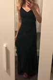 This is an absolutely beautiful dress. If you are smaller it will be a bit loose. It is just a little wider than I was hoping for, and unfortunately the corset-tie in the back only tightens so far without bunching up. The seams in the chest would be fine if you are bustier, but look a bit awkward on me and are kind of see through. The material is very thin, but feels nice and is a gorgeous color. Also, the dress is long. It drags a bit behind me even in 5 inch heels. It's beautiful for taking pictures in, or walking on dry ground in, but dancing or maneuvering in it (especially in wet conditions) may be a little difficult if you are not tall. Fortunately, with a stick-on bra, some heels, and careful footing, it will be fine. It is genuinely so pretty and semi-flattering that even with its shortcomings I love it. - Annika M.